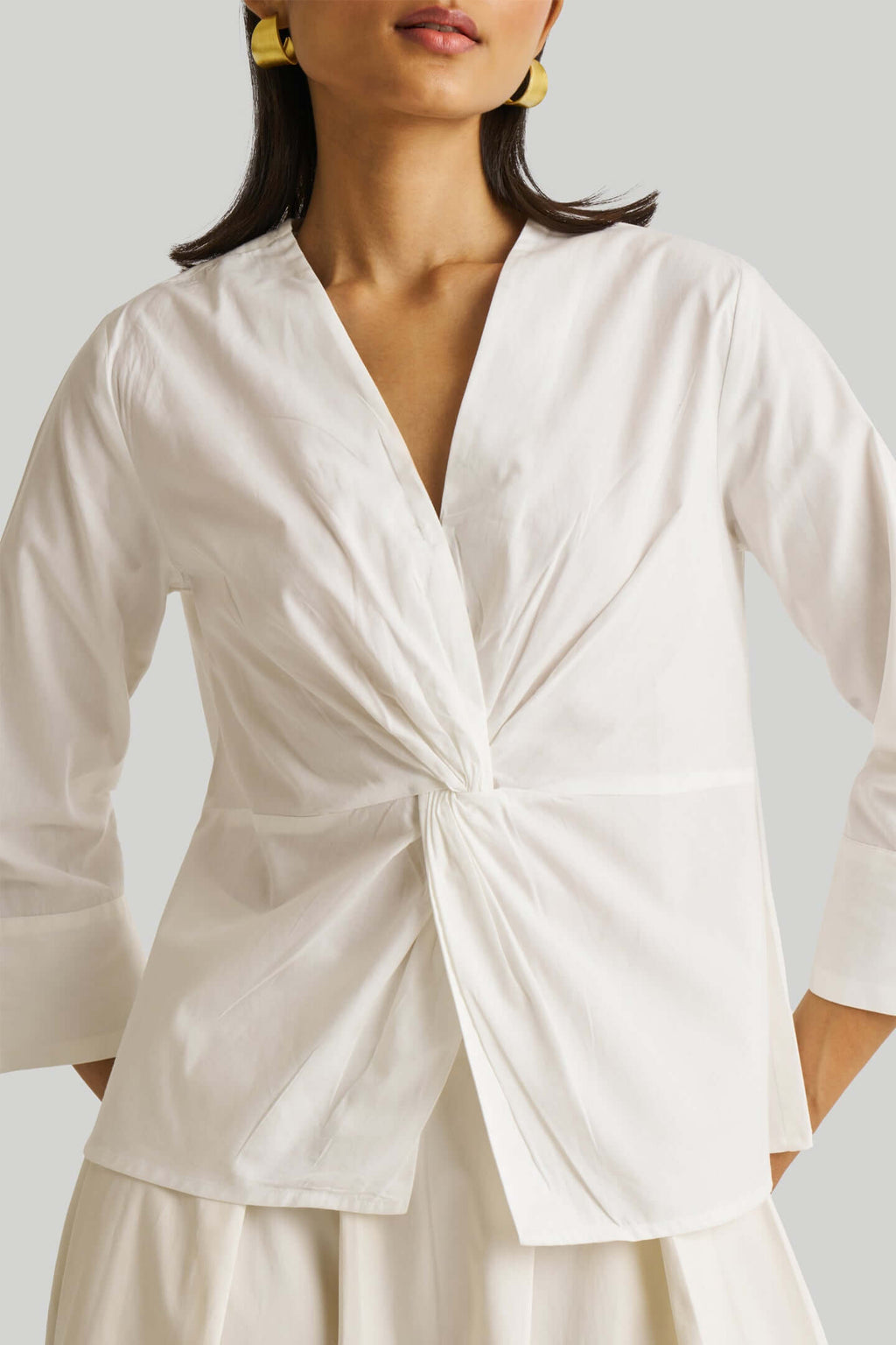 Haut à torsion avant blanc