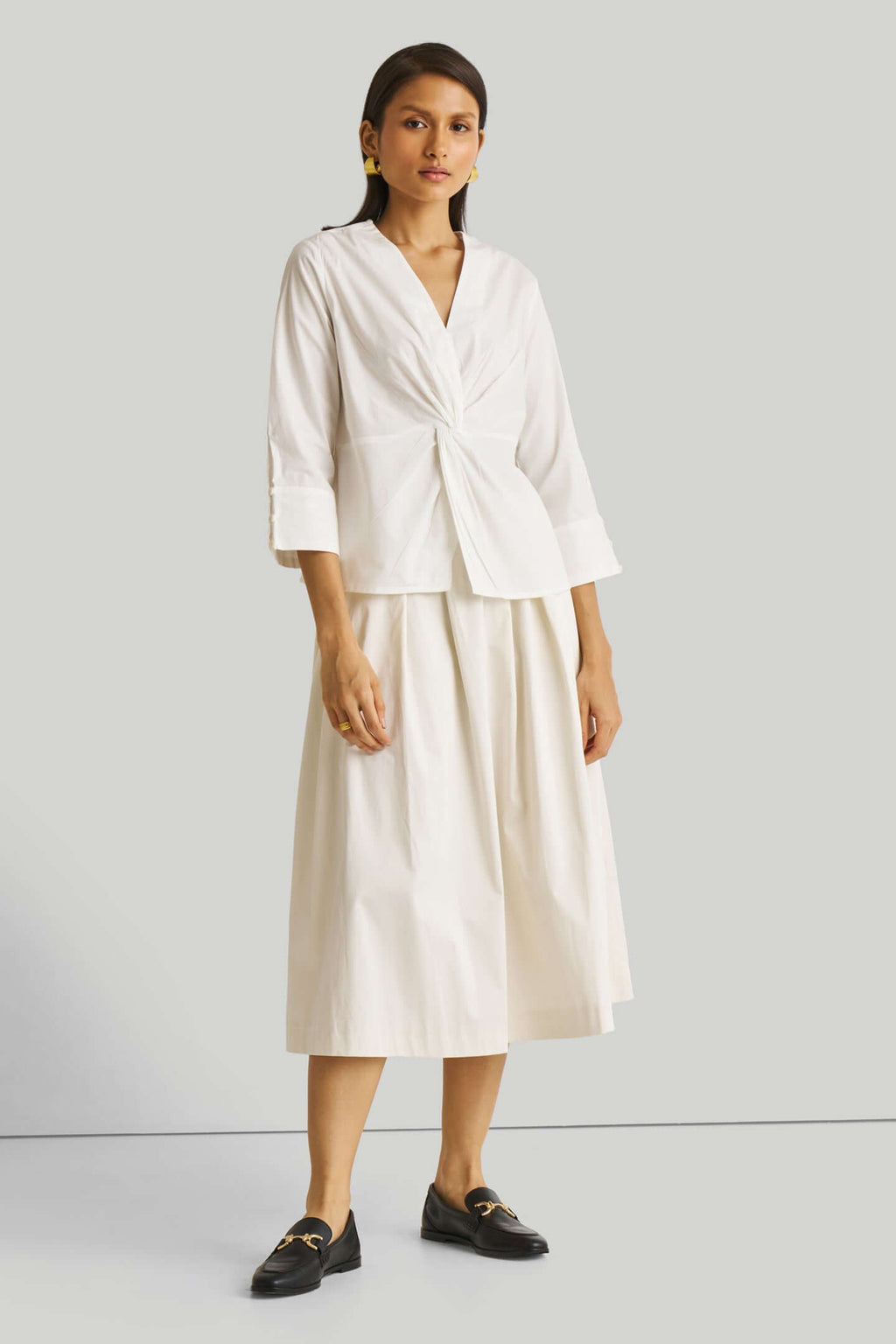 Haut à torsion avant blanc