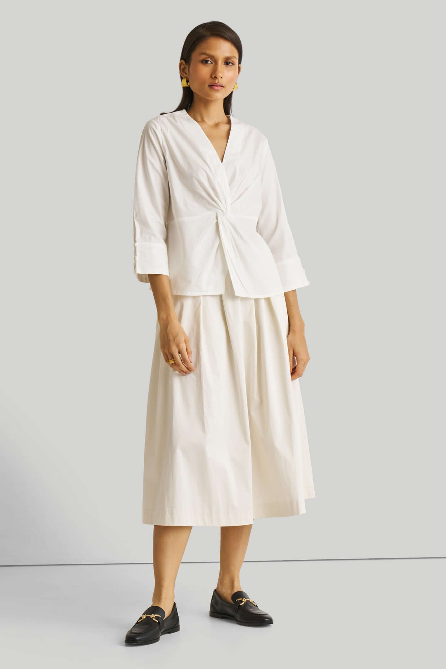 Haut à torsion avant blanc