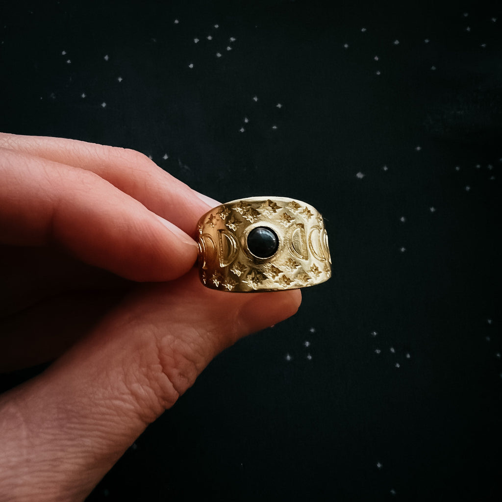 Anillo Eclipse con fases lunares y ópalo negro