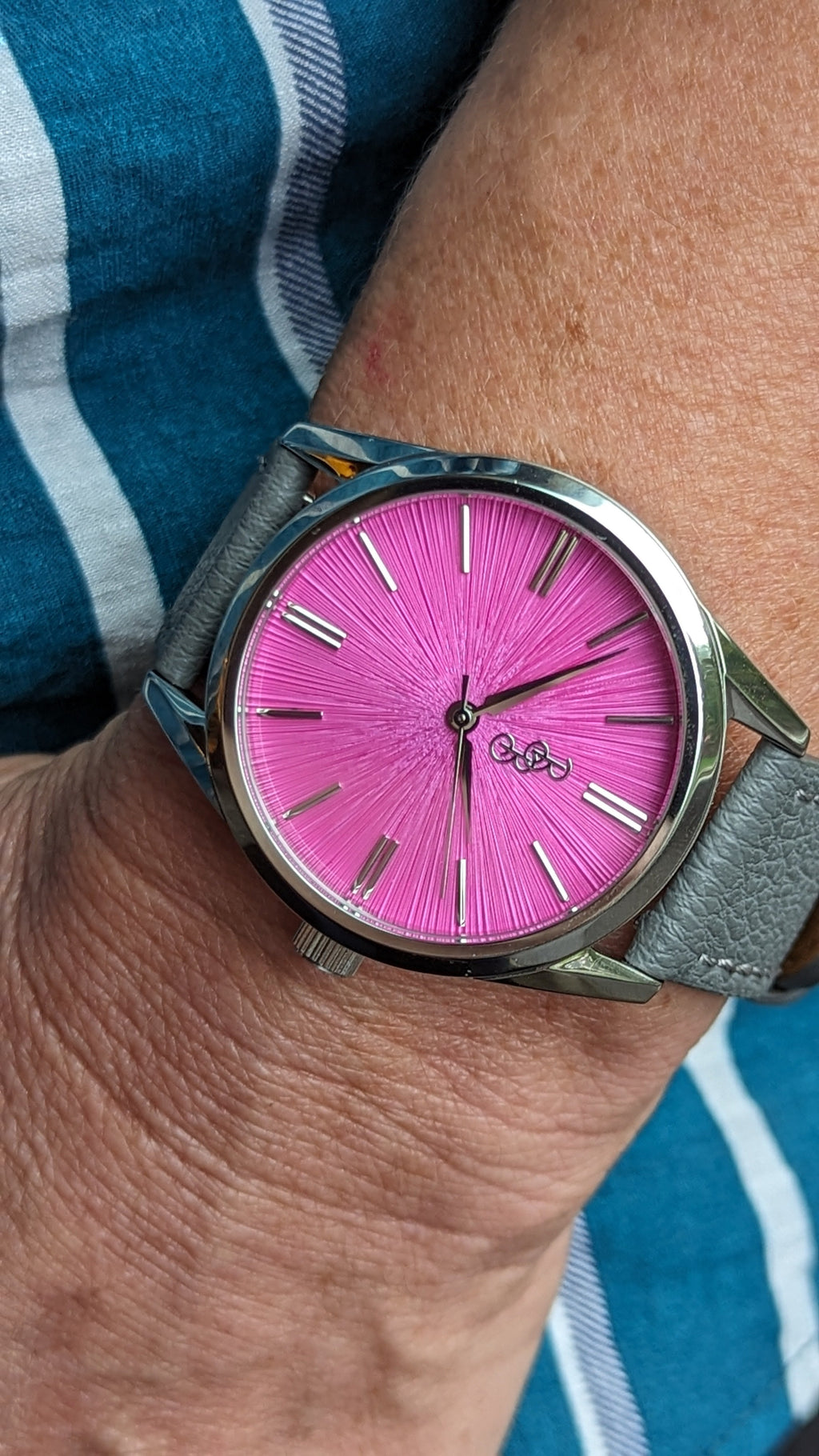 Montre rose soleil